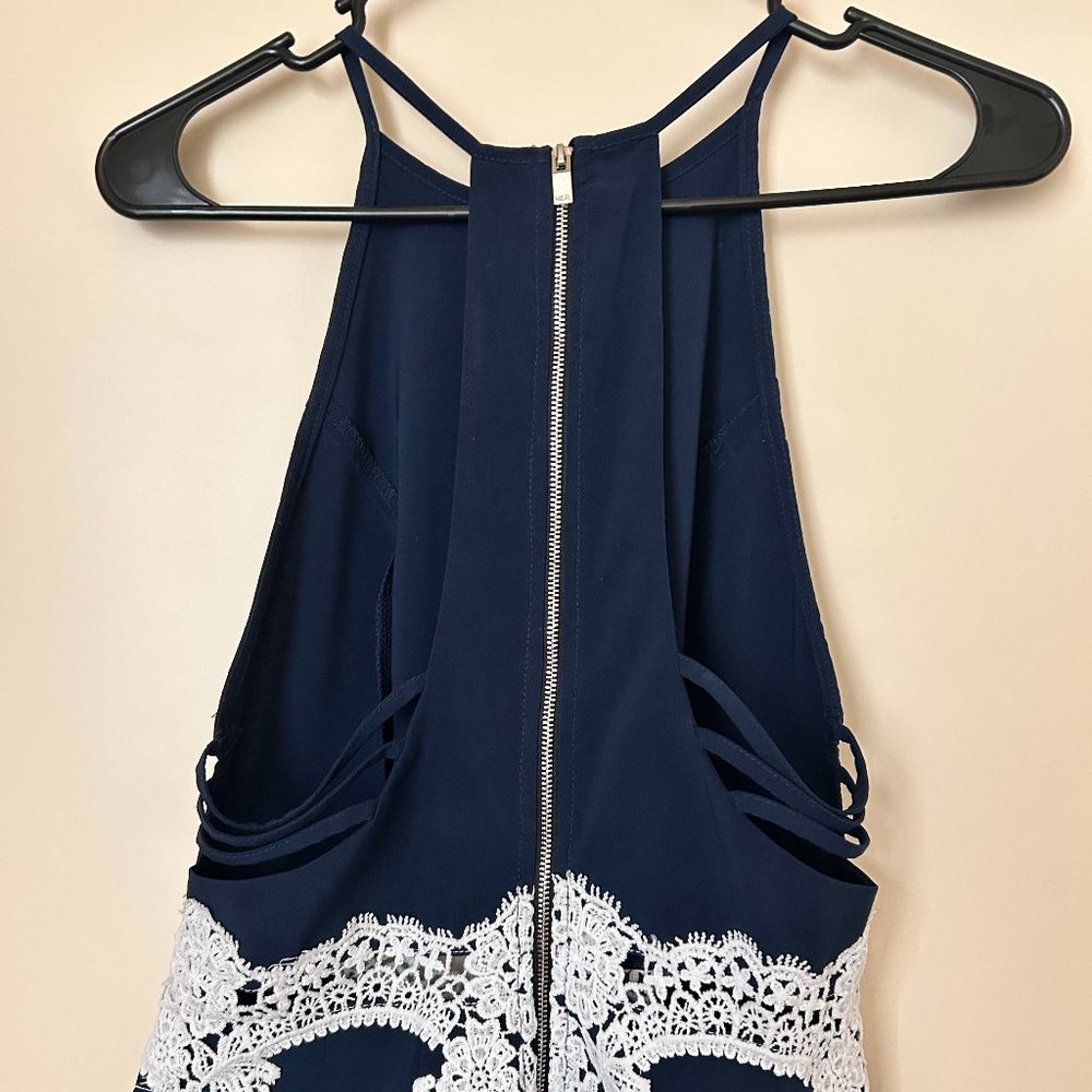 Navy Blue Halter Neck Romper with White Lacy Detail and Open Back - Picture 7 of 8